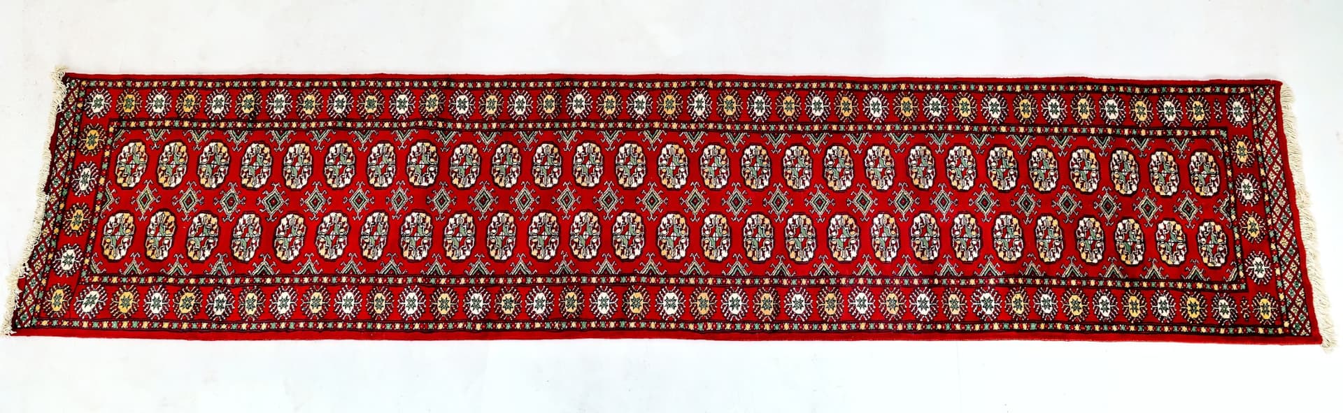 Pakistani Red Bukhara Runner — photograph 1