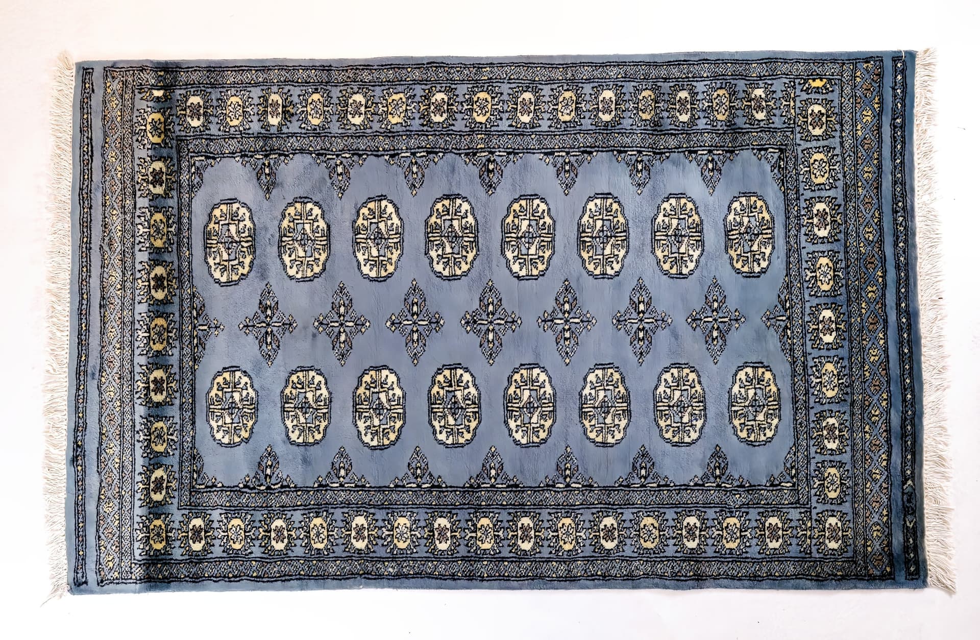 Pakistani Blue Bokhara Rug — photograph