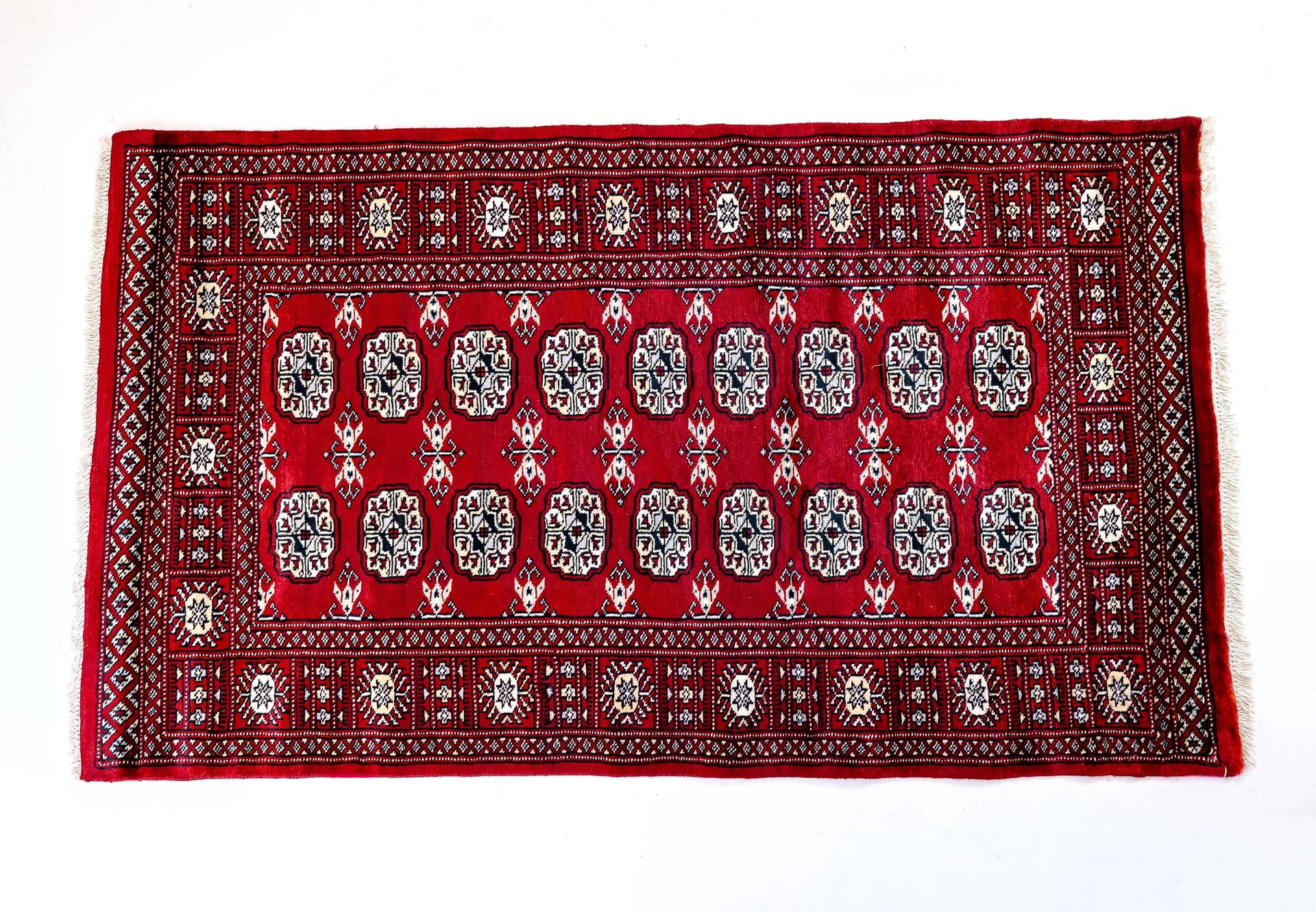 Pakistani Red Bokhara Rug — photograph