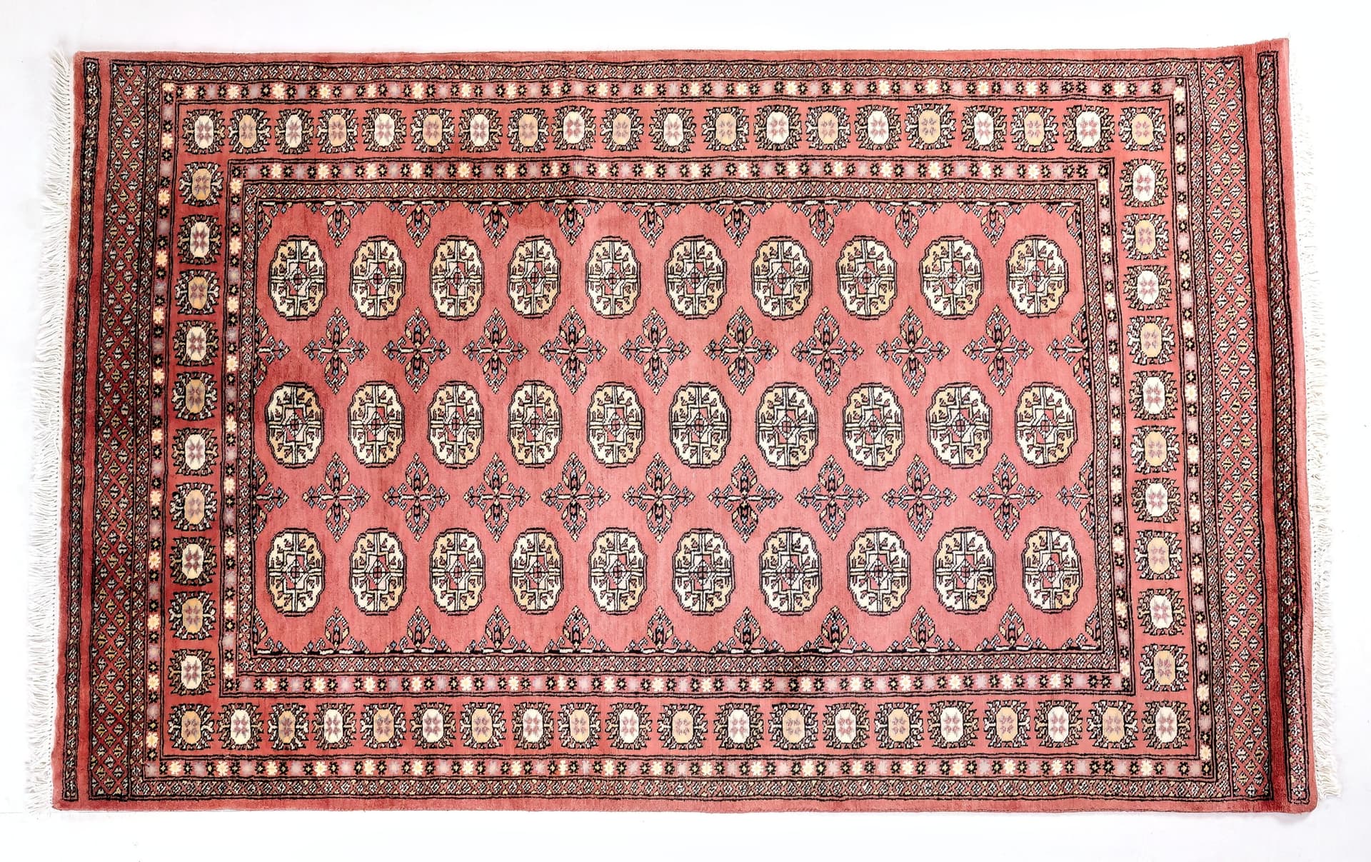 Pakistani Rusty Pink Bukhara — Elephant's Foot — photograph 1
